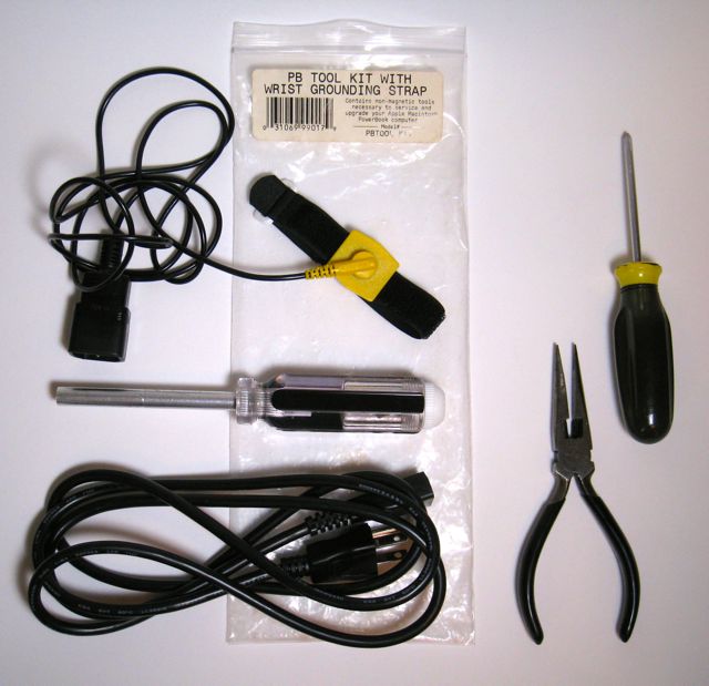 grounding strap, long-nose pliers, screwdriver
